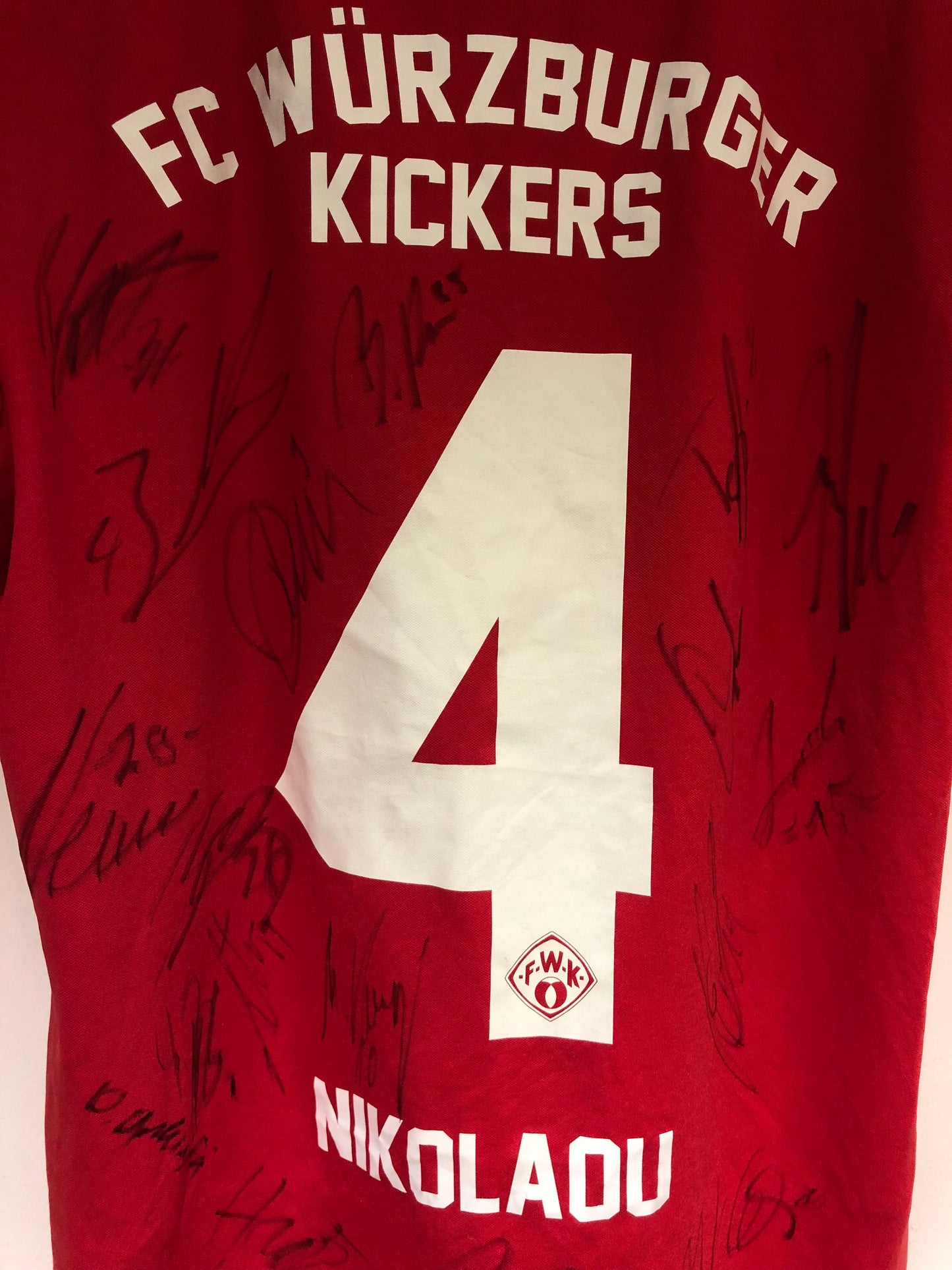 Würzburger Kickers 2017-18 Home Kit. Signed #4 Nikolau (L)